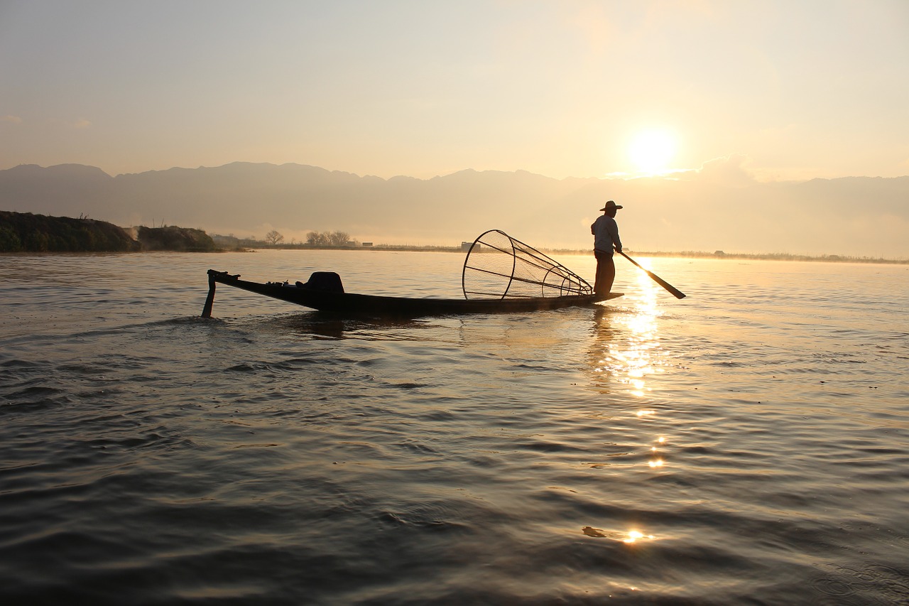 fisherman with his fish trap